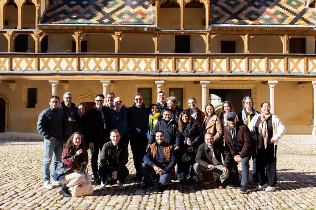 Attendees arriving at Hospices de Beaune for EO Paris Chapter morning session