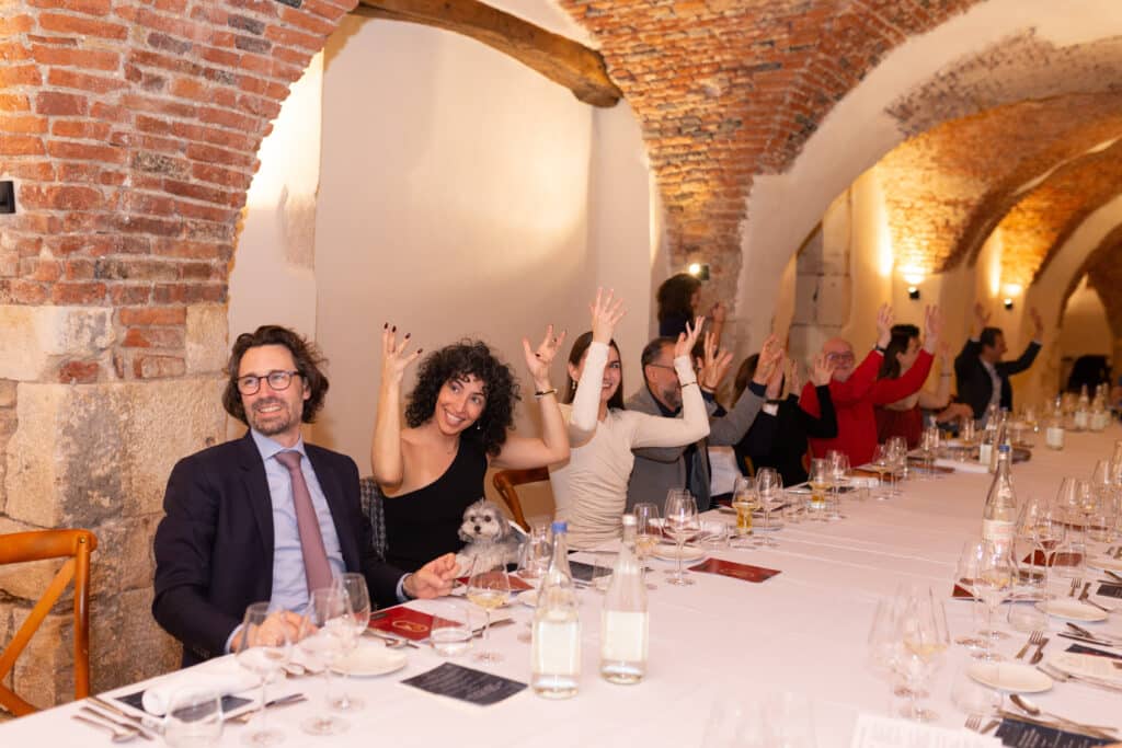 Group enjoying gala dinner during retreat