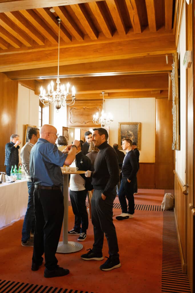 Jason Barnard with EO Paris Chapter participants having coffee and informal discussions in Beaune